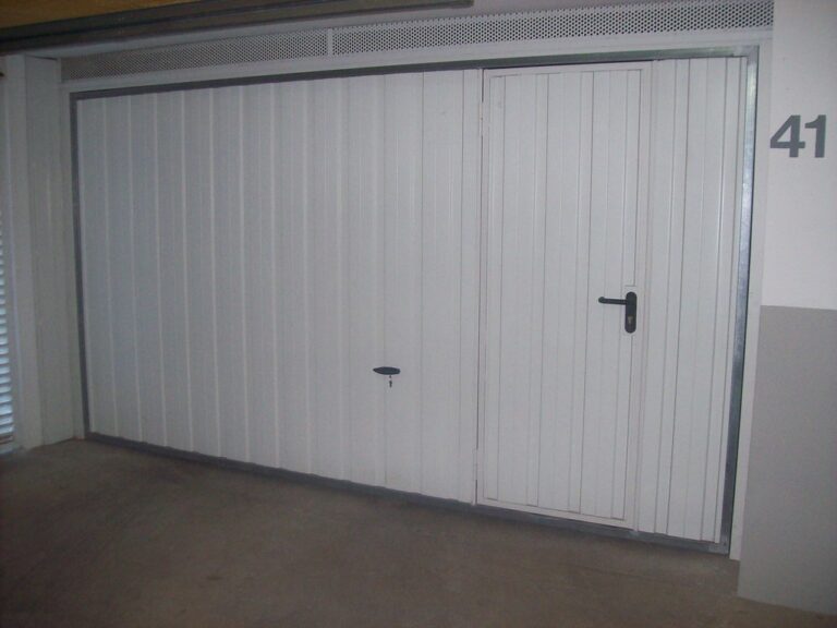 ARREGLAR PUERTA GARAJE SEGURO HOGAR