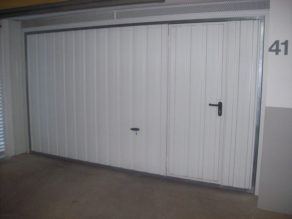 ARREGLAR PUERTA GARAJE SEGURO HOGAR